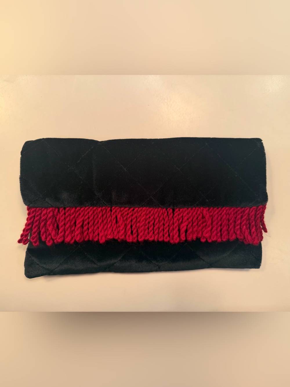 Black Quilted Clutch with Red Fringe Accent